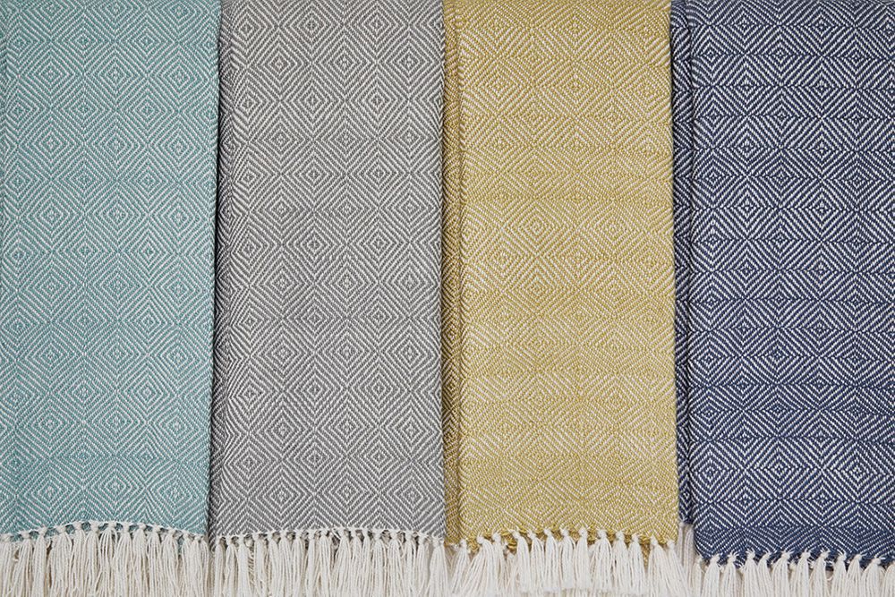 Weaver Green blankets in a selection of different colours